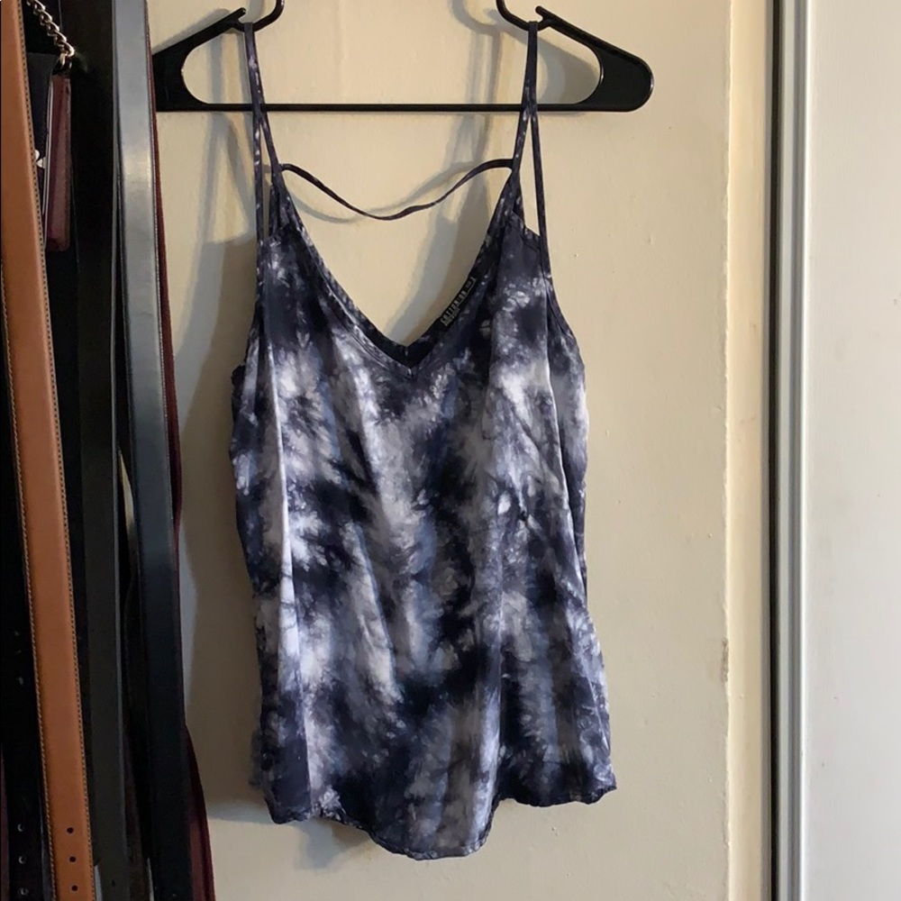 A blue tie-dye blouse